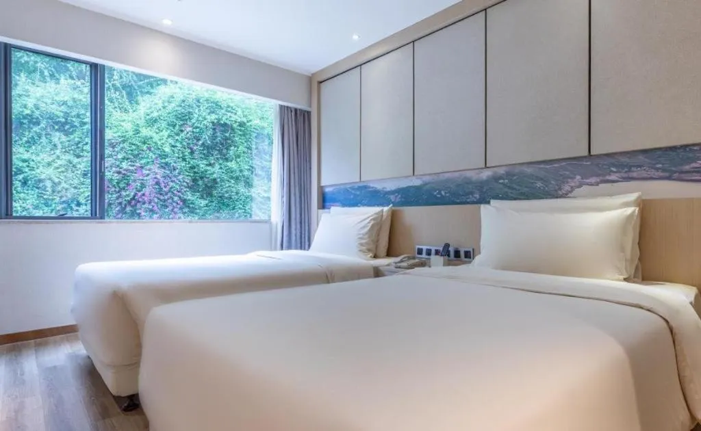 Bed in Atour Hotel Xiamen City Government Dongdu Passenger Transport Terminal