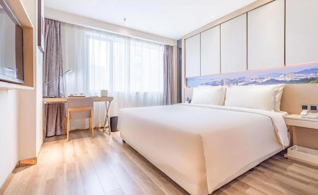 Bed in Atour Hotel Xiamen City Government Dongdu Passenger Transport Terminal