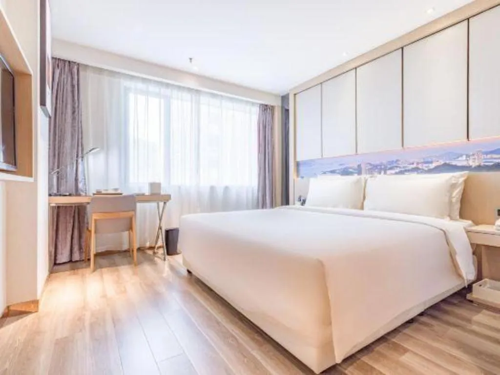 Bed in Atour Hotel Xiamen City Government Dongdu Passenger Transport Terminal