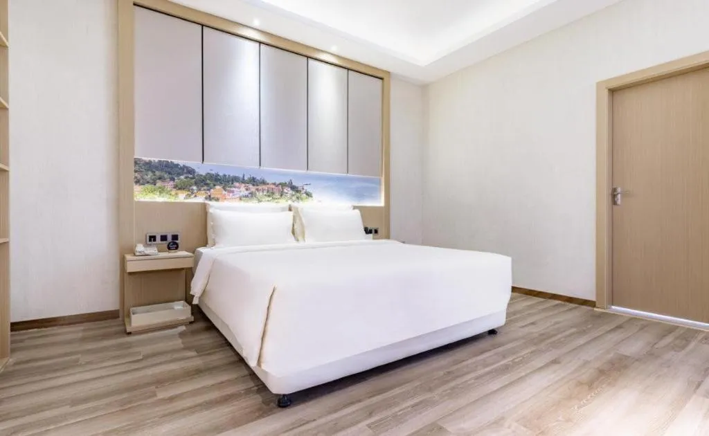 Bed in Atour Hotel Xiamen City Government Dongdu Passenger Transport Terminal