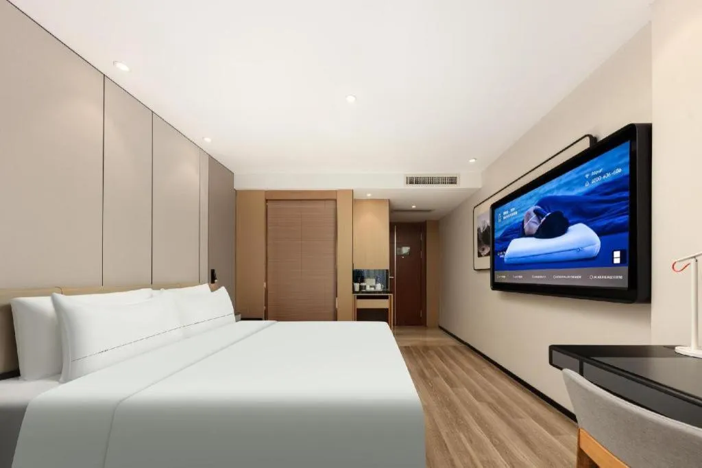 Bed in Atour Hotel Xiamen City Government Dongdu Passenger Transport Terminal