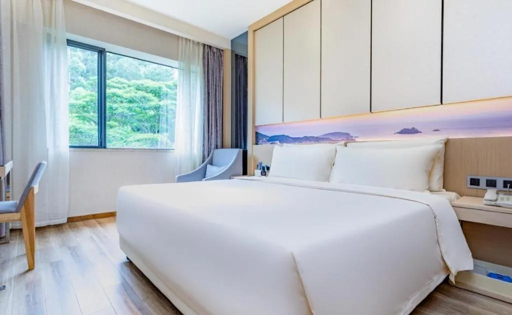 Bed in Atour Hotel Xiamen City Government Dongdu Passenger Transport Terminal