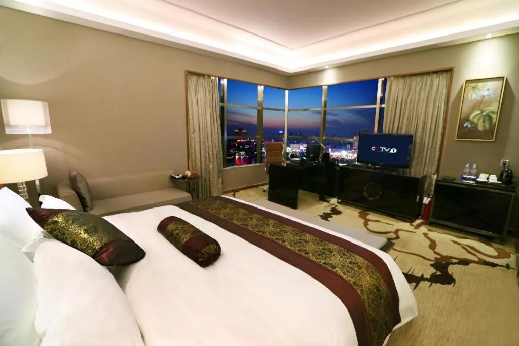 Bed in Yihao International Hotel