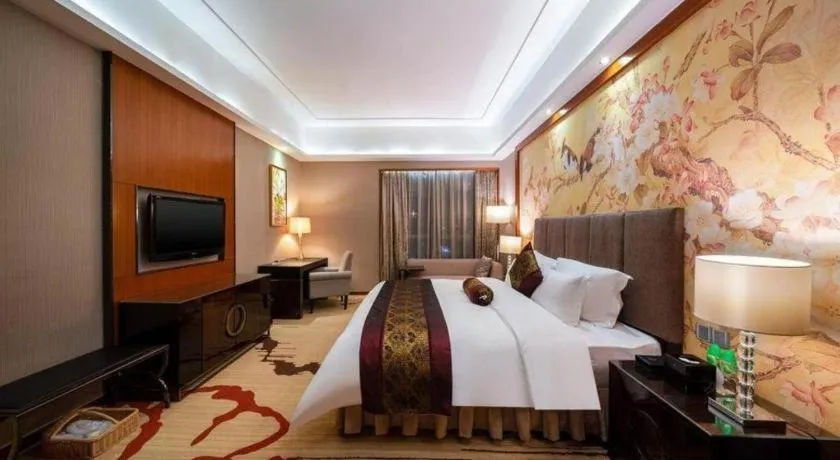 Bed in Yihao International Hotel