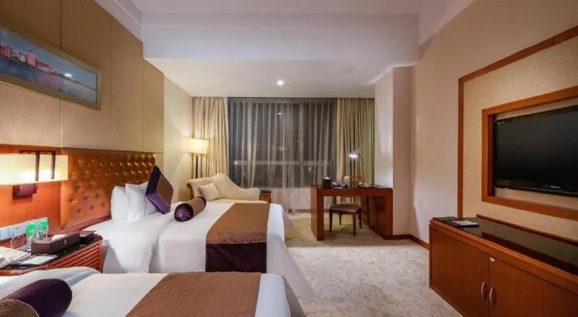 Bed in Yihao International Hotel