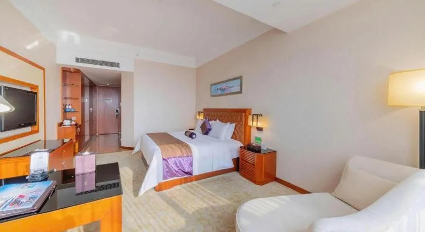 Bed in Yihao International Hotel