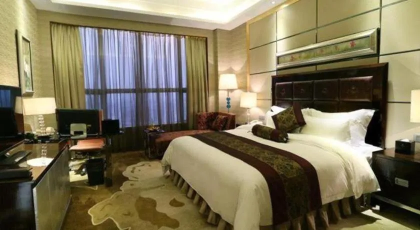 Bed in Yihao International Hotel