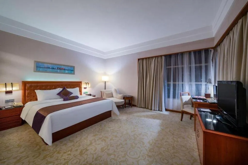 Bed in Yihao International Hotel