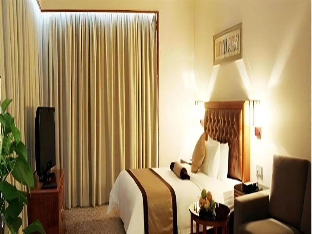 Bed in Yihao International Hotel