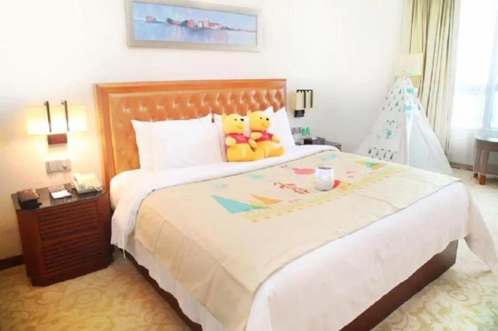 Bed in Yihao International Hotel