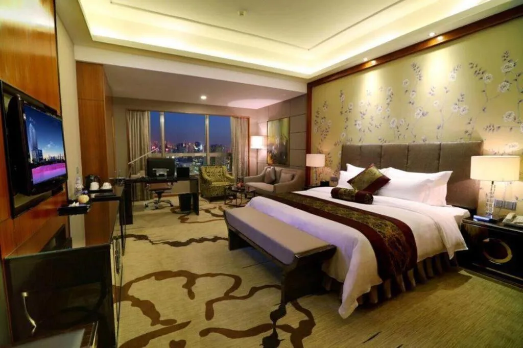 Bed in Yihao International Hotel