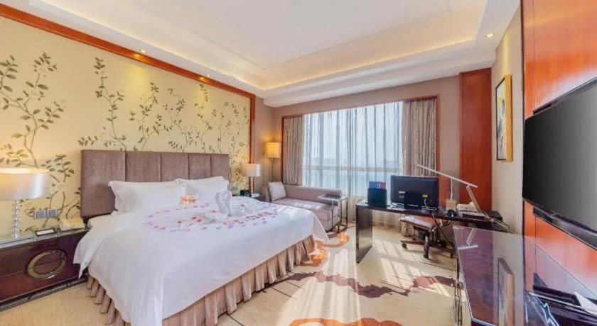 Bed in Yihao International Hotel