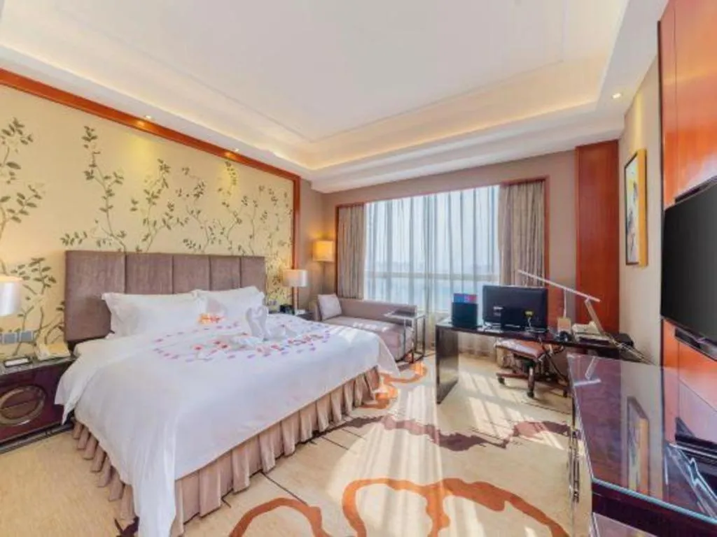 Bed in Yihao International Hotel