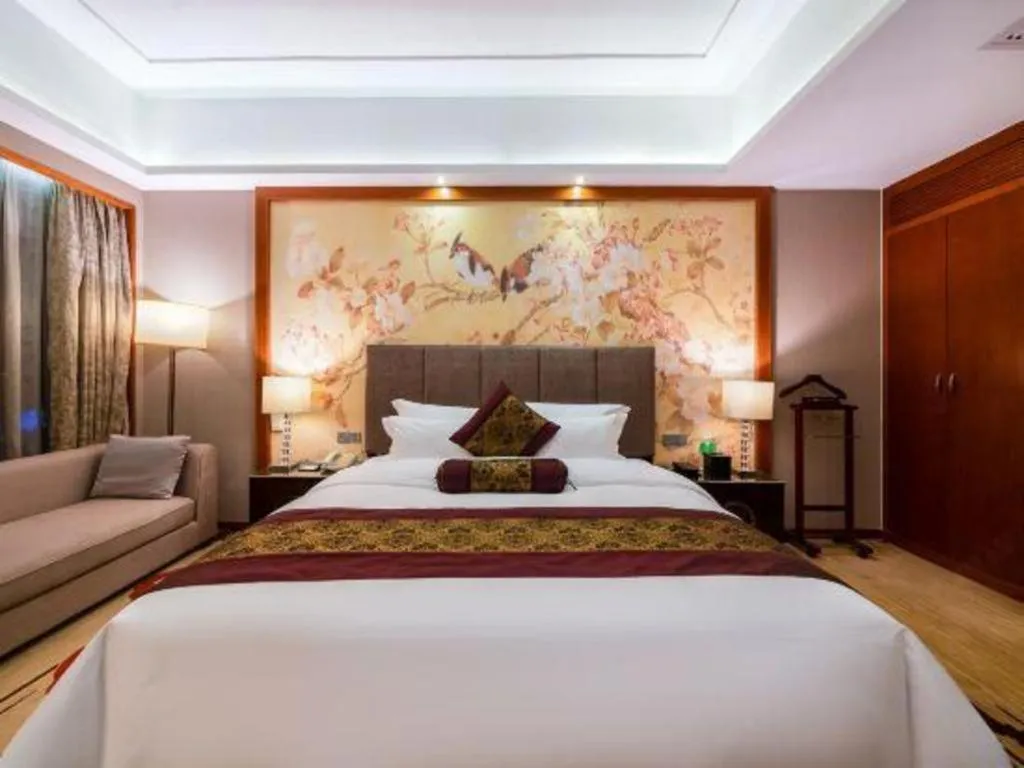 Bed in Yihao International Hotel