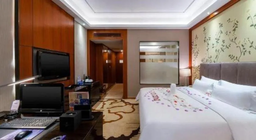 Bed in Yihao International Hotel