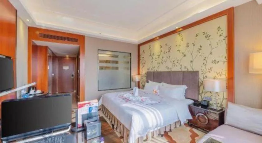 Bed in Yihao International Hotel