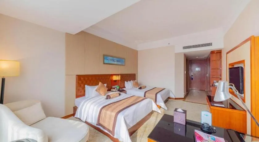 Bed in Yihao International Hotel