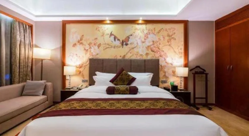 Bed in Yihao International Hotel