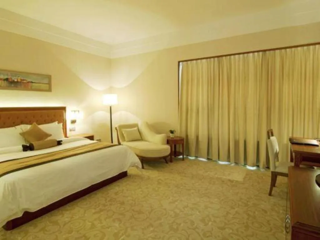 Bed in Yihao International Hotel