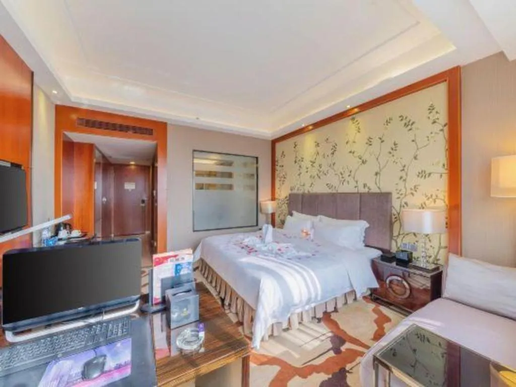 Bed in Yihao International Hotel