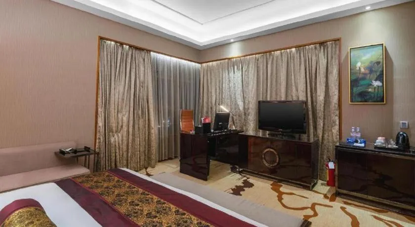 Bed in Yihao International Hotel