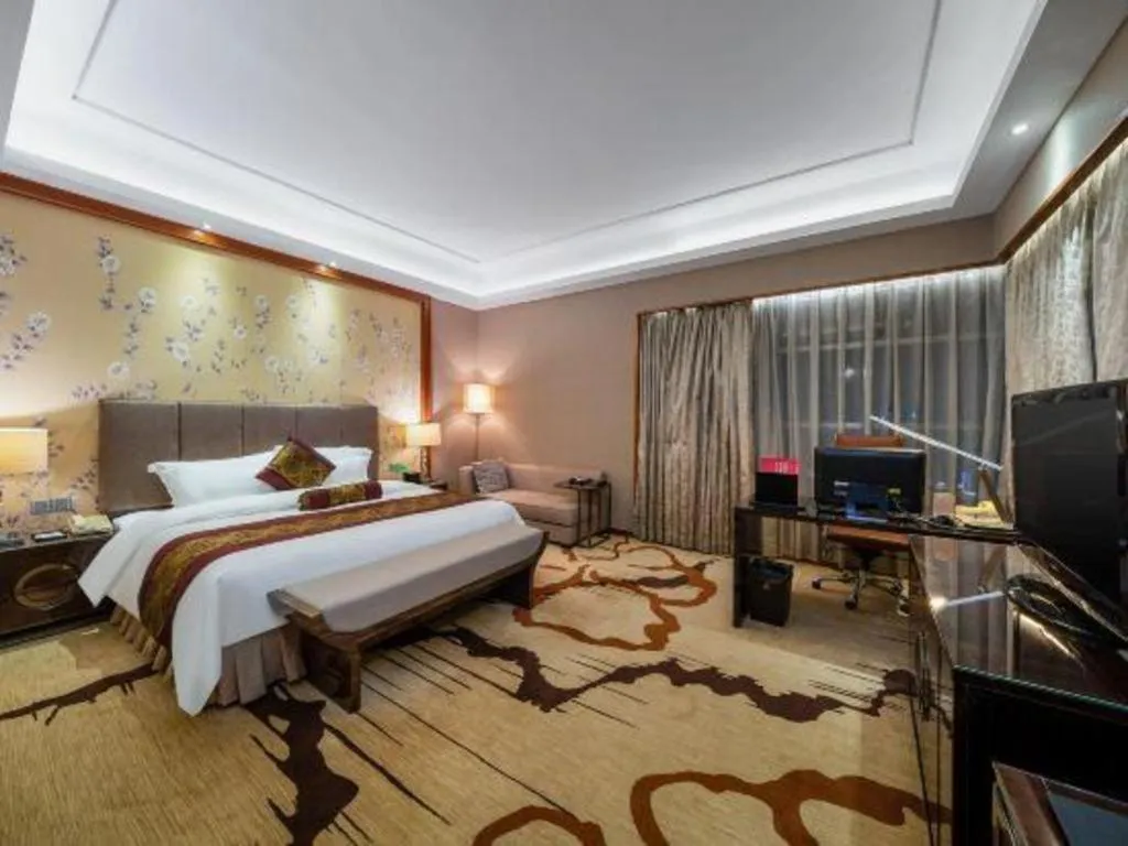 Bed in Yihao International Hotel