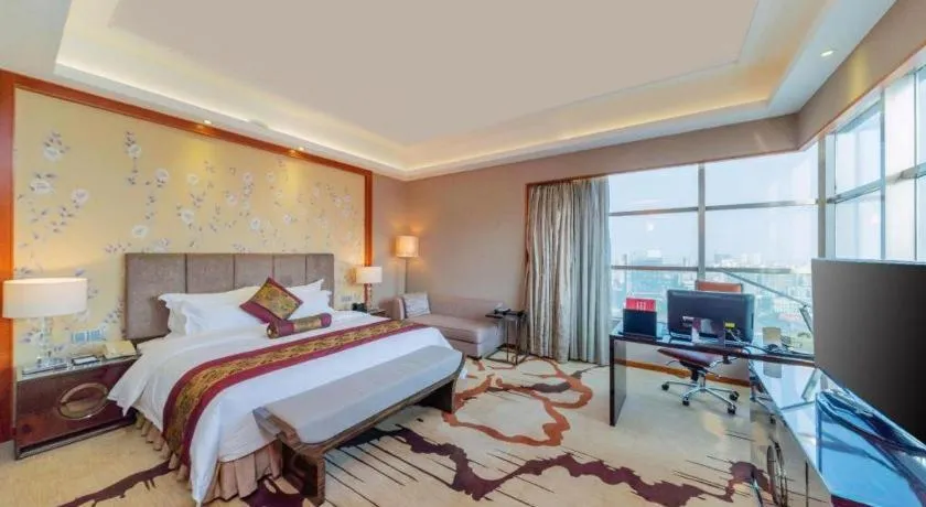 Bed in Yihao International Hotel