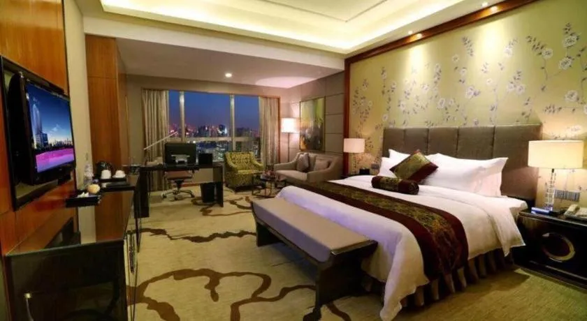 Bed in Yihao International Hotel