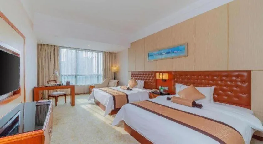 Bed in Yihao International Hotel