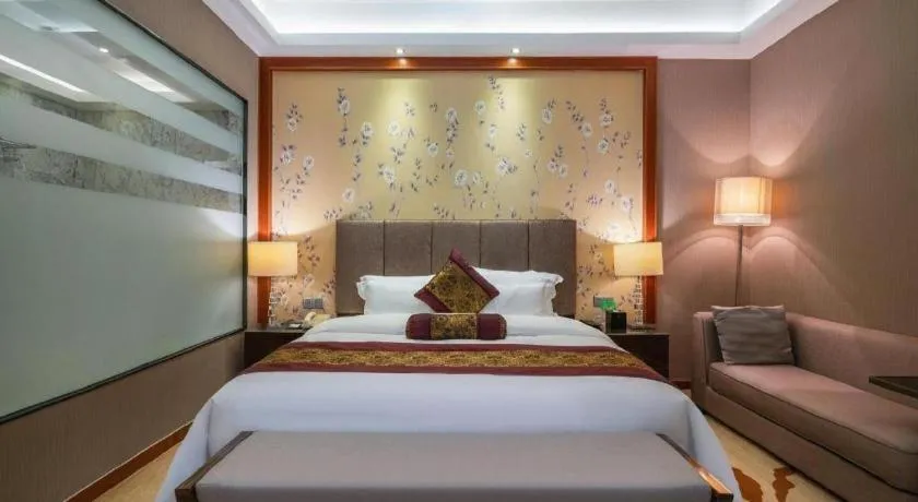 Bed in Yihao International Hotel
