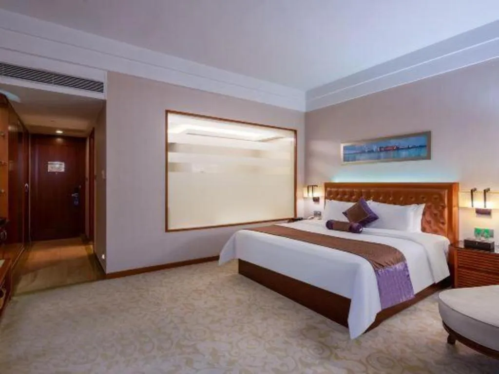 Bed in Yihao International Hotel