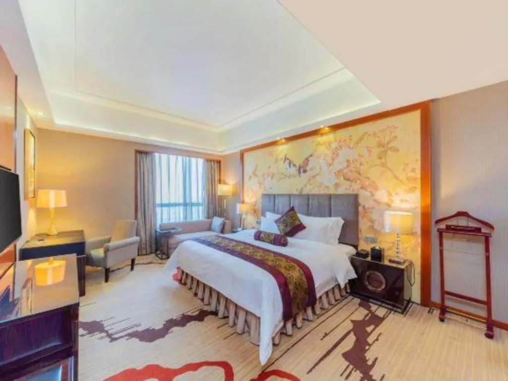 Bed in Yihao International Hotel