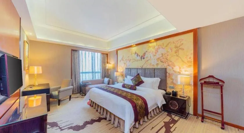 Bed in Yihao International Hotel