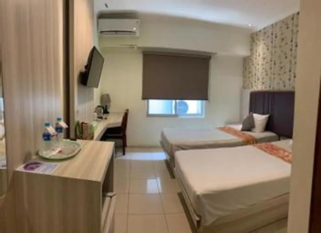 Bed in Jelita Tanjung Hotel