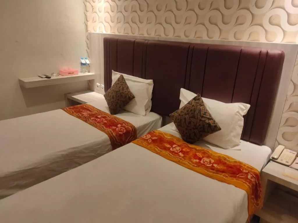 Bed in Jelita Tanjung Hotel