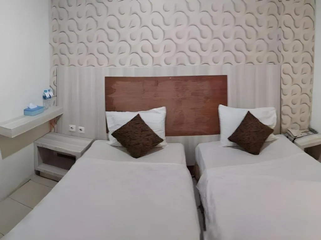 Bed in Jelita Tanjung Hotel