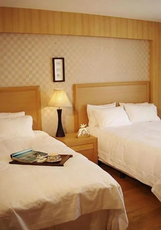 Bed in Suanbo Park Hotel