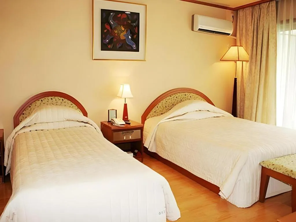 Bed in Suanbo Park Hotel