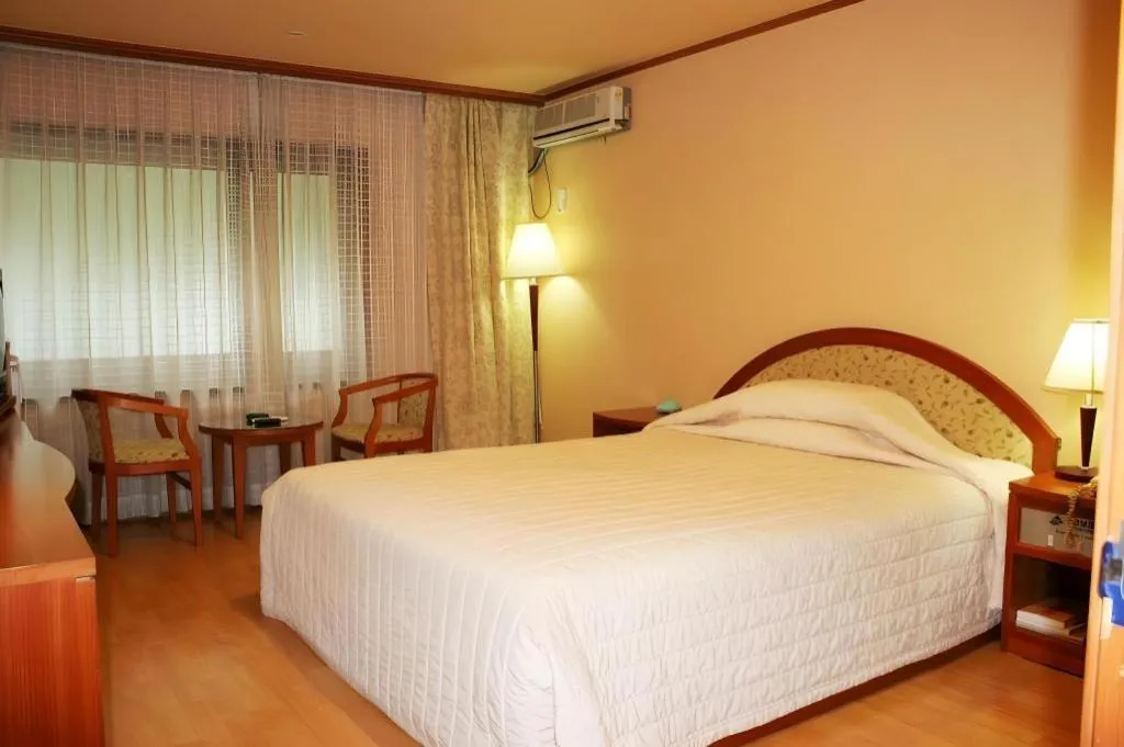 Bed in Suanbo Park Hotel
