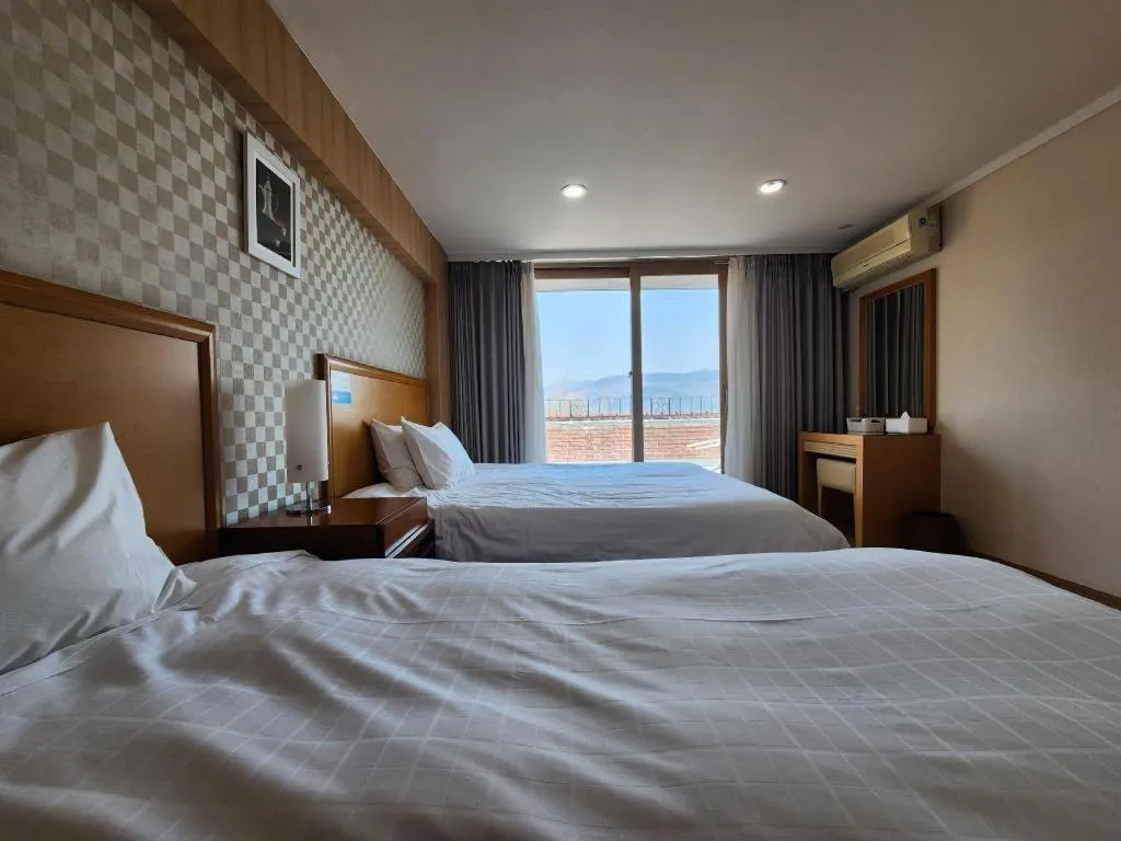 Bed in Suanbo Park Hotel