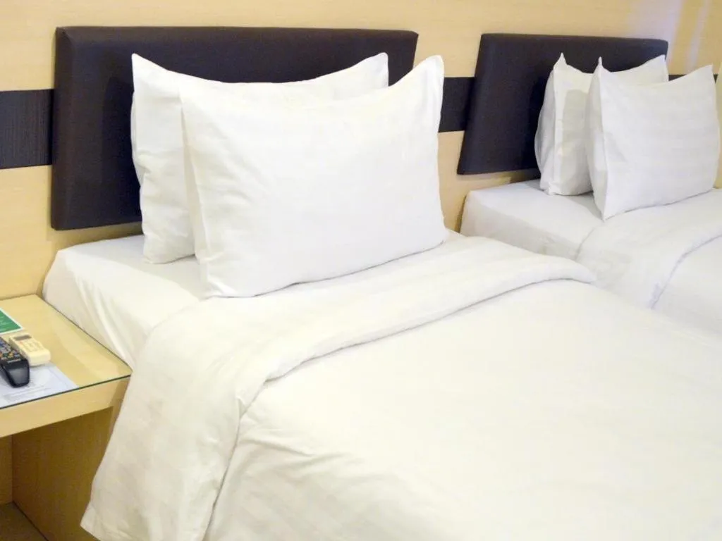 Bed in Sumi Hotel Mangga Besar