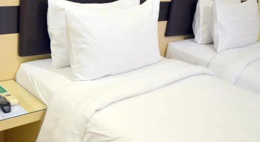 Bed in Sumi Hotel Mangga Besar