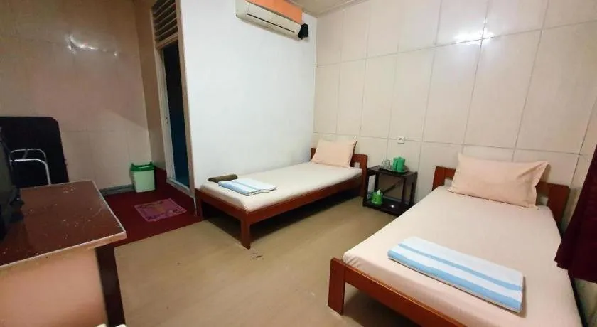 Bed in Hotel Sinar Khatulistiwa
