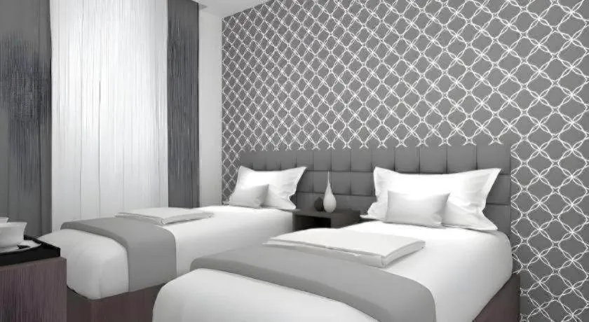 Bed in Smart Budget Hotel