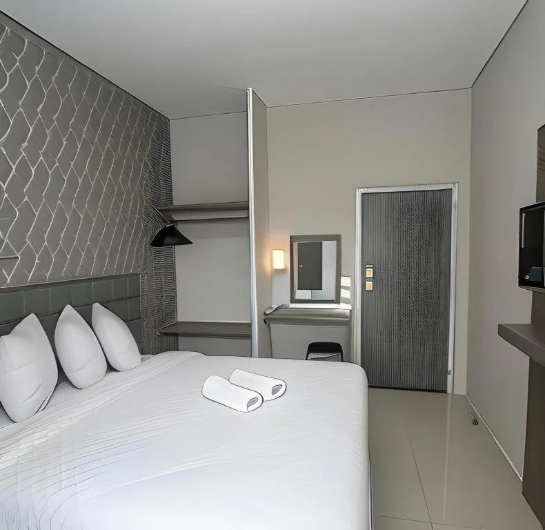 Bed in Smart Budget Hotel