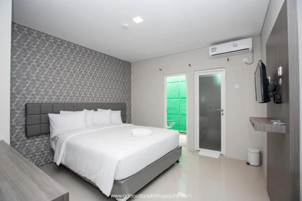 Bed in Smart Budget Hotel