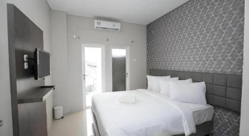 Bed in Smart Budget Hotel