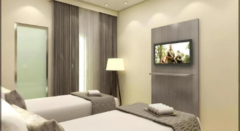 Bed in Smart Budget Hotel