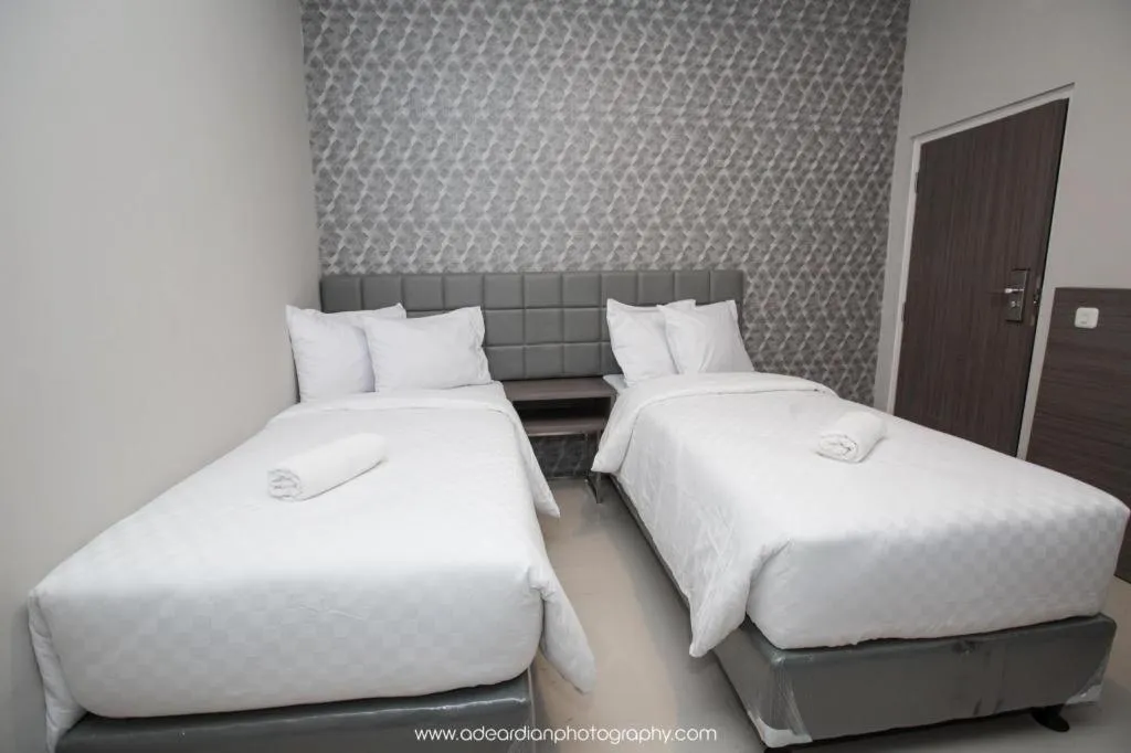 Bed in Smart Budget Hotel