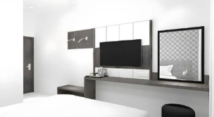 Bed in Smart Budget Hotel